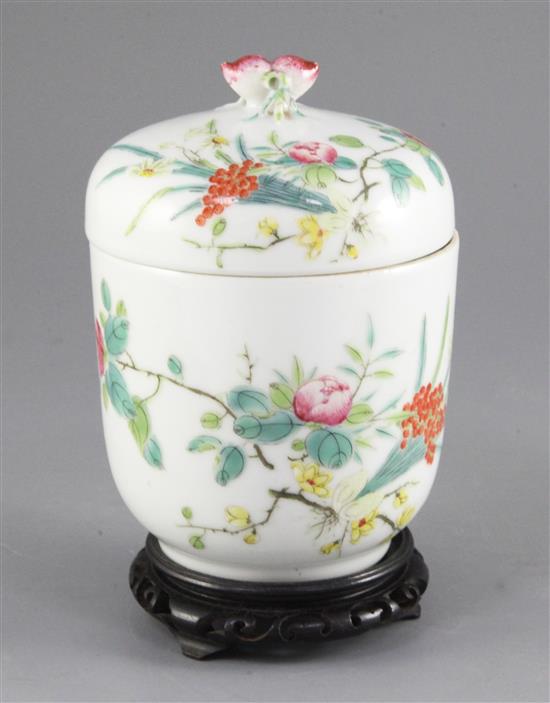 A Chinese famille rose jar and cover, Guangxu six character mark and of the period (1875-1908), height 15cm, wood stand
